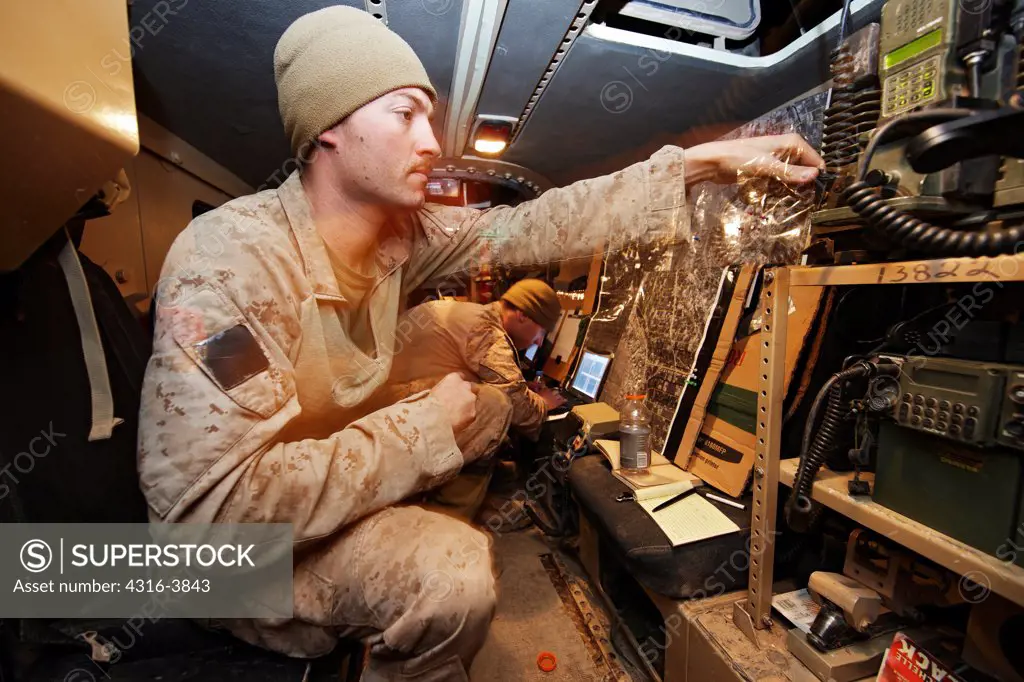 A U.S. Marine Corps Radio Operator Inside a Mobile Command and Control Center During a Combat Operation in Afghanistan's Helmand Province