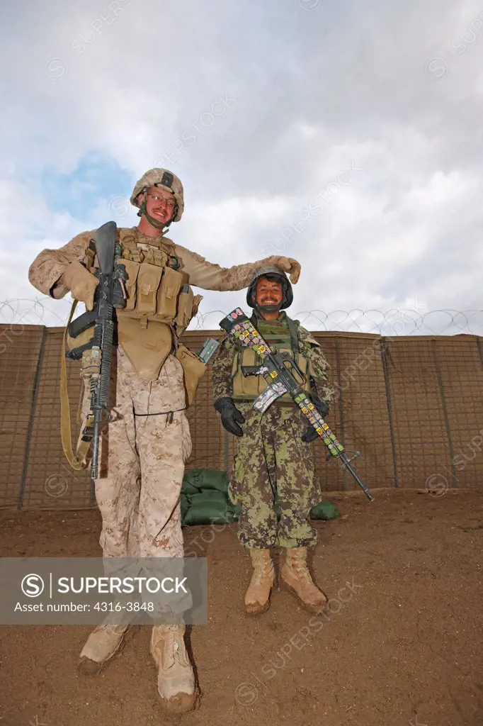 U.S. Marine And Afghan National Army Soldier