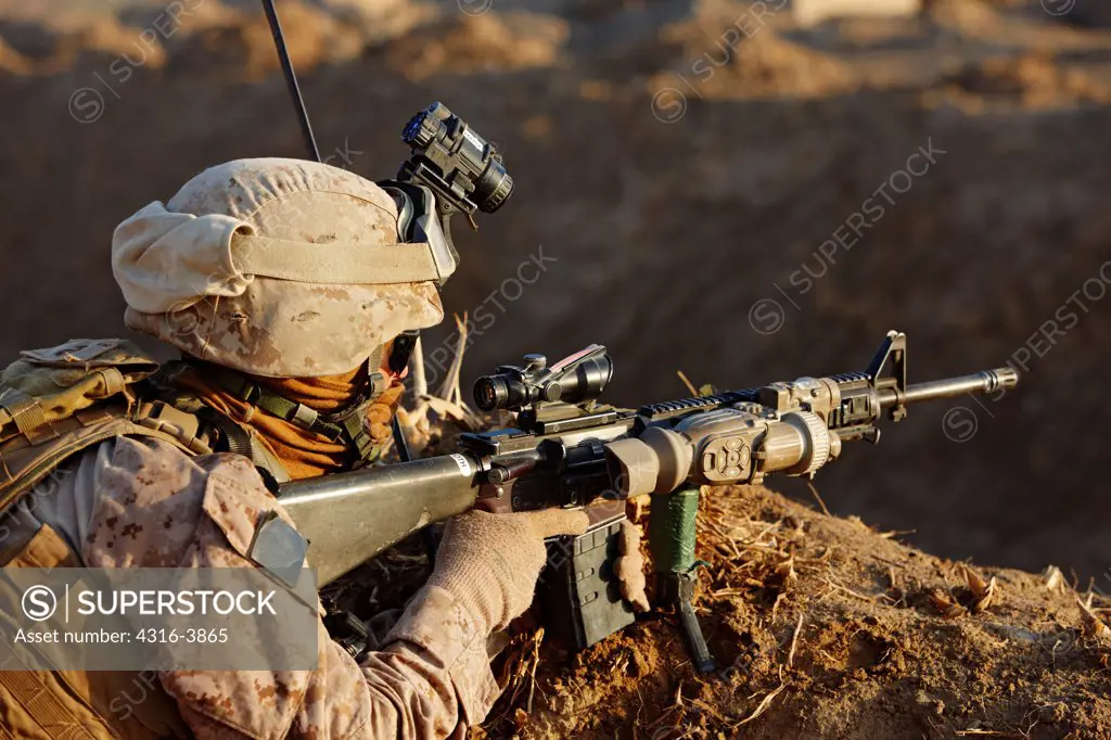 U.S. Marine With M16 During Combat Operation in Afghanistan's Helmand Province