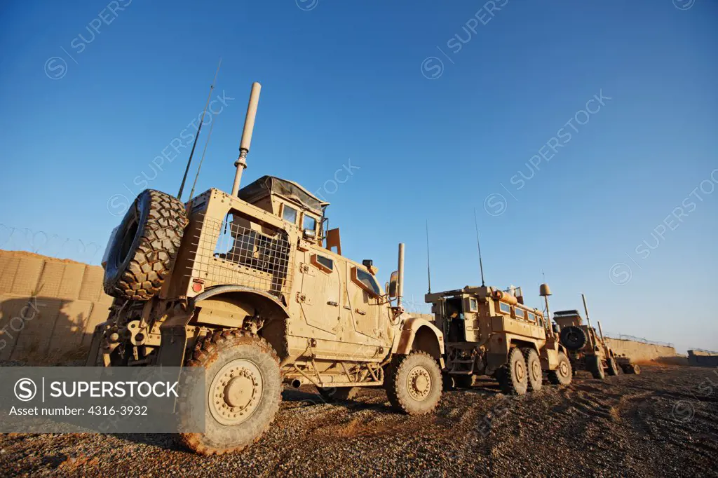 A Line of MRAPs, or Mine Resistant Ambush Protected Vehicles, at a U.S. Marine Corps Forward Operating Base in Afghanistan's Helmand Province