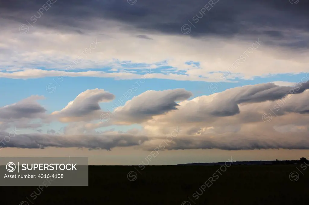Scud Clouds in Wave Formation Over Plains