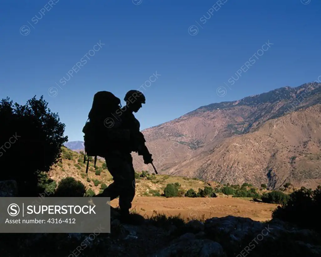 Silhouette of a US Marine in the Foothills of the Hindu Kush Mountains