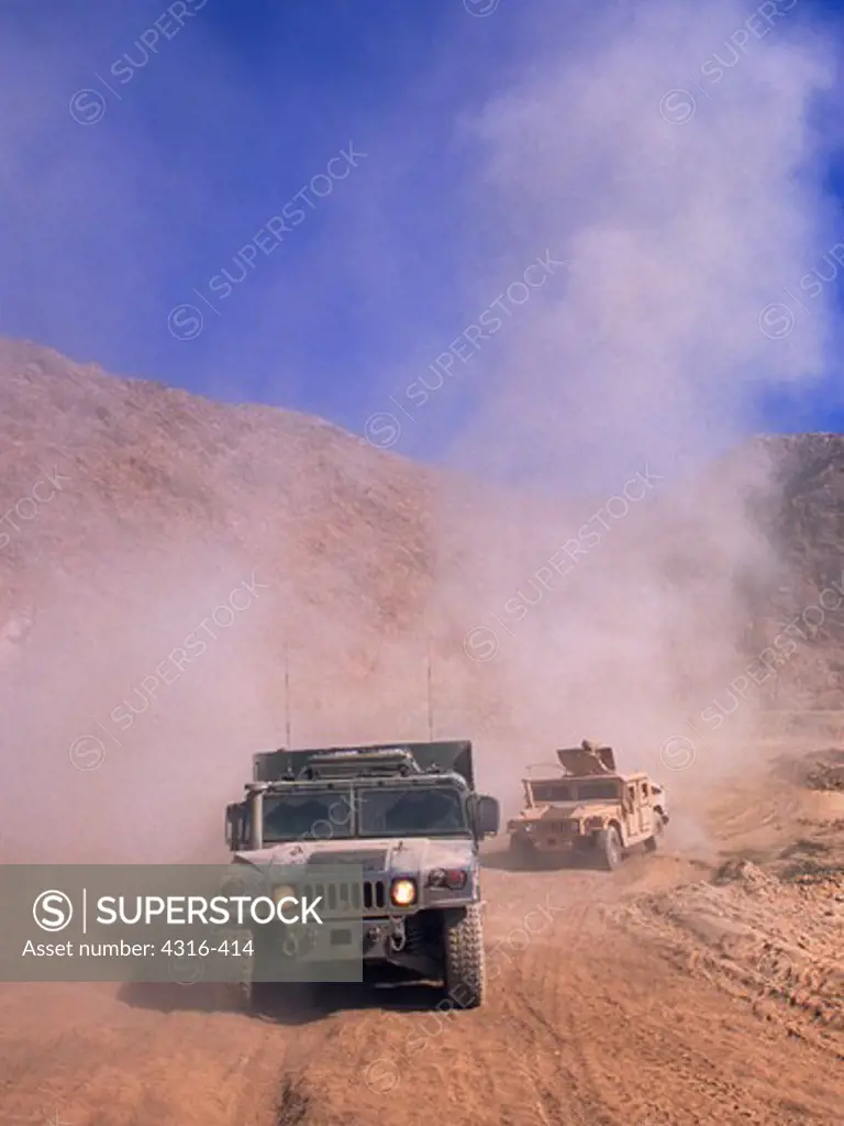 Humvees on the Dusty Road Between Asadabad and Jalalabad, Afghanistan