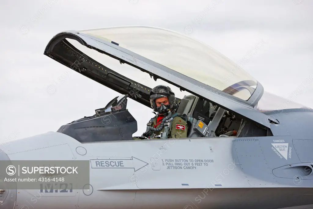 Pilot in Cockpit of an F-16, Canopy Closing