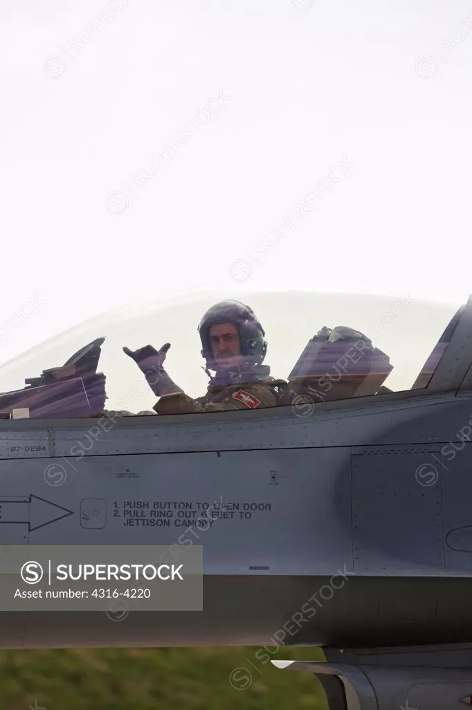 Pilot Makes a Hang Loose Gesture Prior to Launch of an F-16
