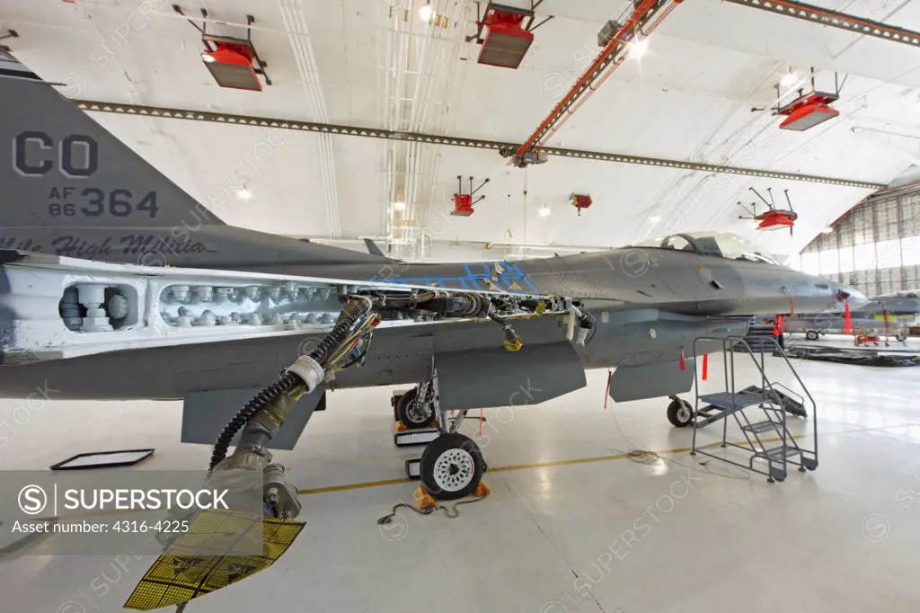 F-16 in Maintenance Hangar, Showing Disassembled Wing