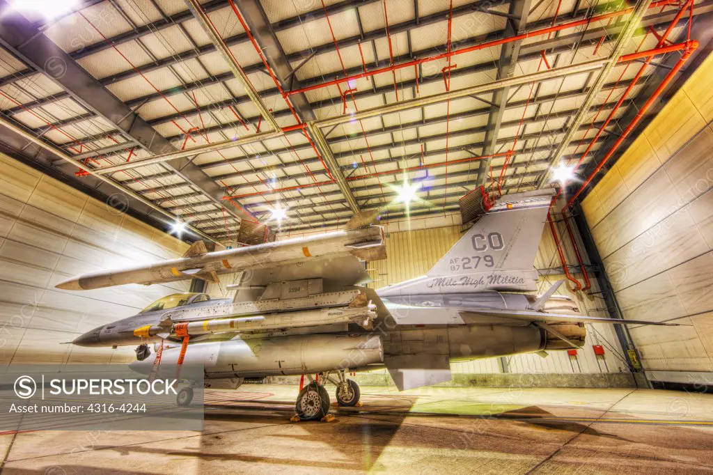 F-16 Alert Jet in Hangar, Loaded with Live Weapons, Low Side View, High Dynamic Range, or HDR Image