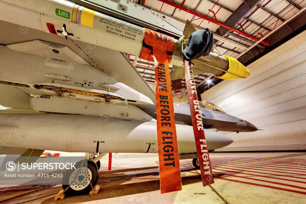 F-16 Alert Jet in Hangar, Loaded with Live Weapons, Side View, High Dynamic Range, or HDR Image