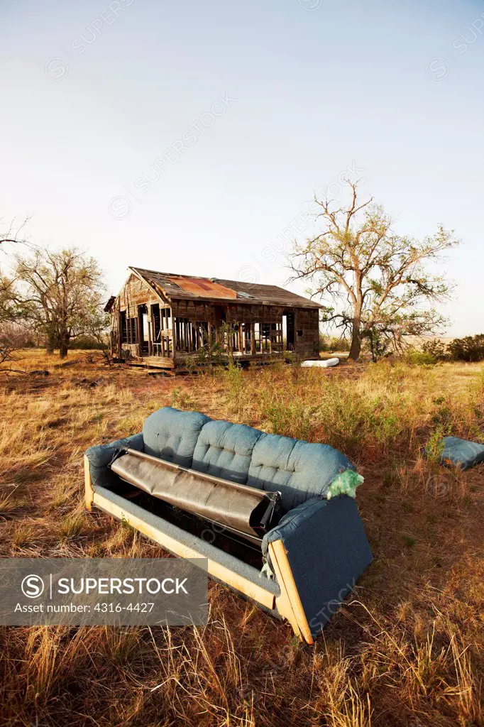 Abandoned couch at abandoned ranch house, eastern plains of Colorado, USA