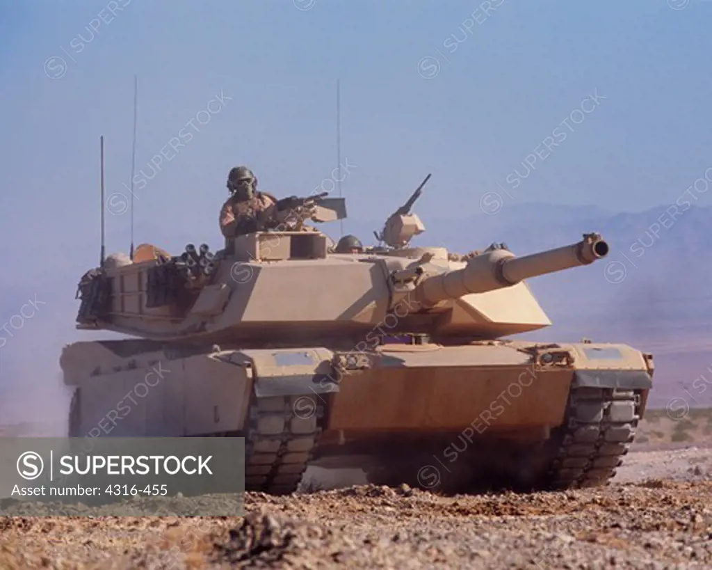 A US Marine Corps M1A1 Abrams Battle Tank Roars Through The Desert