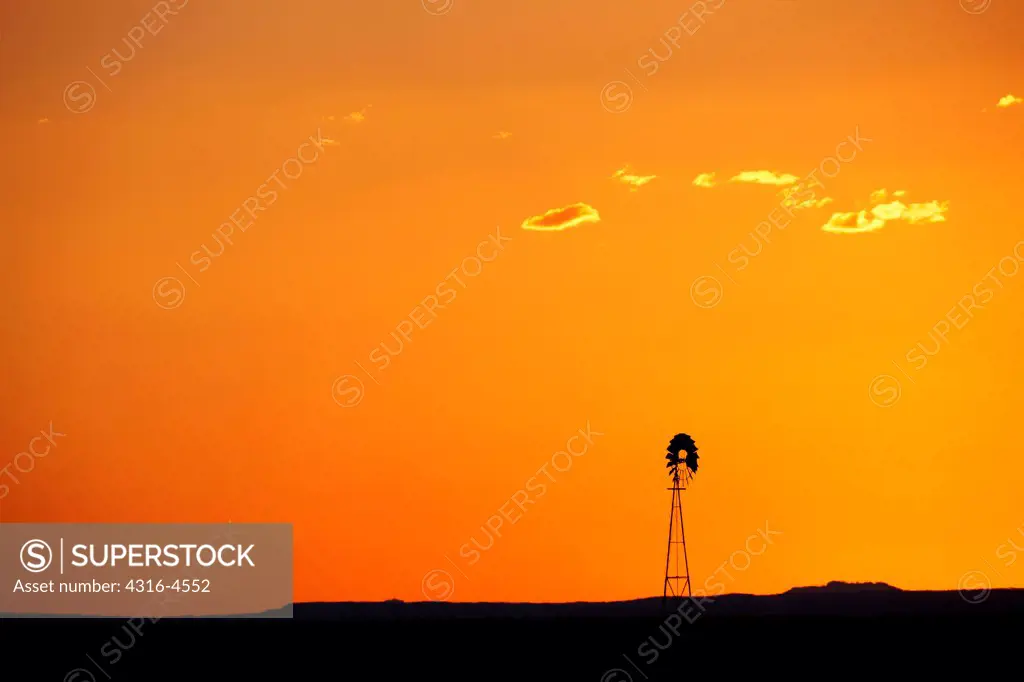 Lone windmill on plains, Colorado, USA
