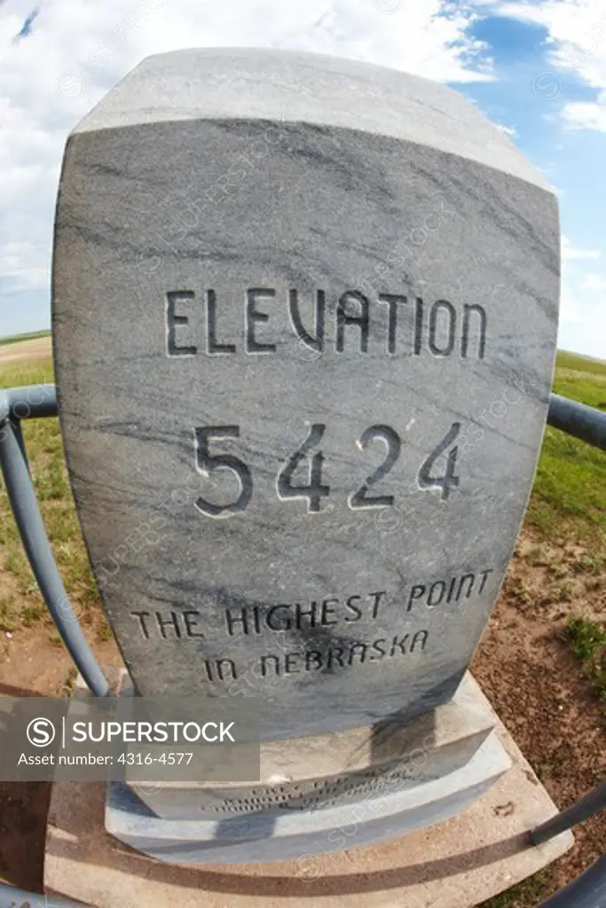Stone marker at Nebraska's highest elevation point, Panorama Point, 5,424 feet above sea level