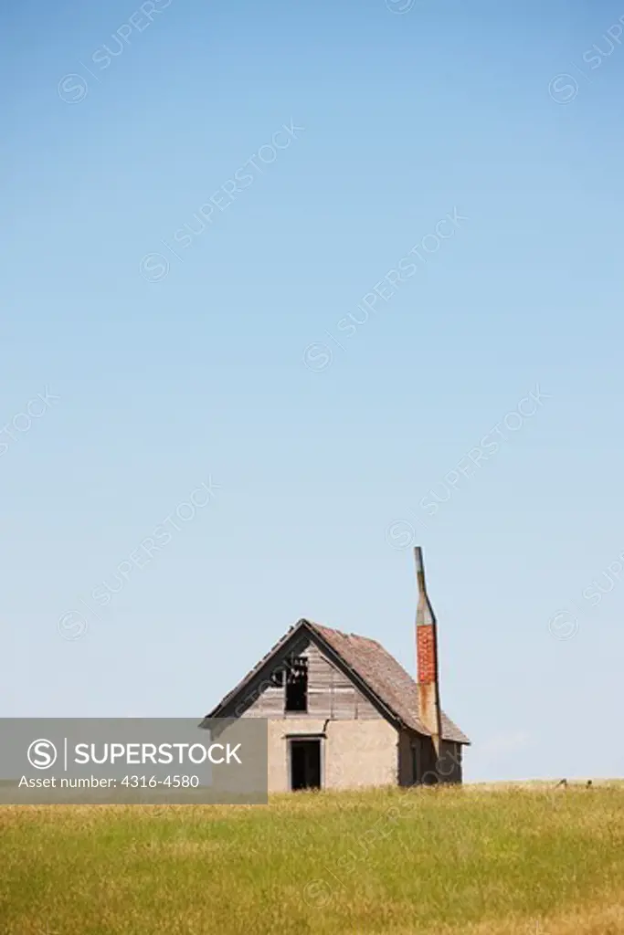 Old ranch house with large chimney, eastern plains of Colorado