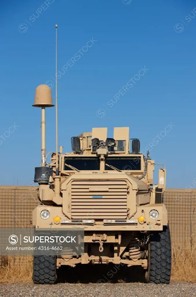 MRAP, or Mine Resistant, Ambush Protected  Vehicle parked at a remote, austere United States Marine Corps forward operating base in Afghanistan's Helmand Province