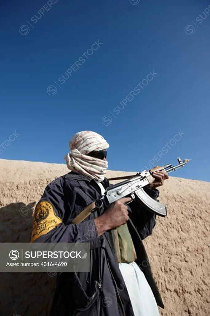 Afghan fighter during a combat operation in Afghanistan's Helmand Province
