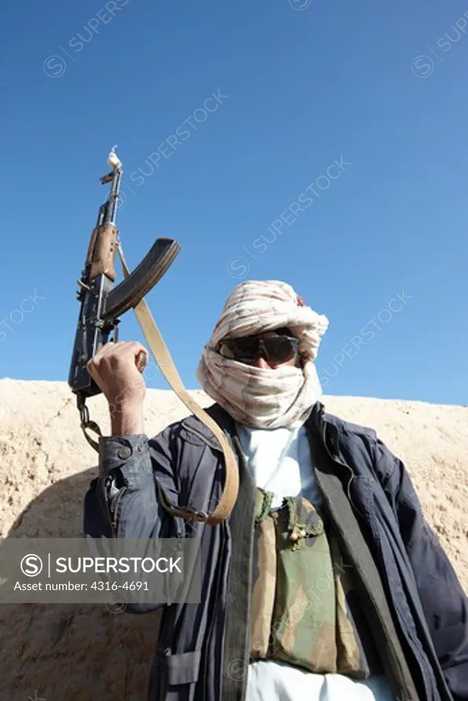 Afghan fighter during a combat operation in Afghanistan's Helmand Province