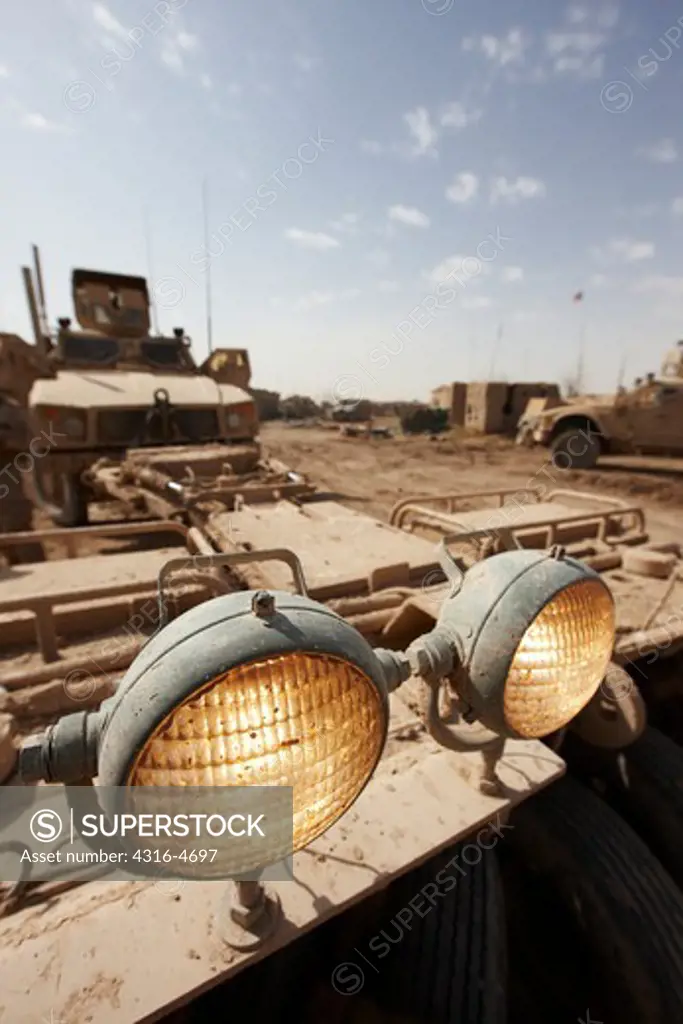 Detail of driving lights mounted on a mine roller attached to an M-ATV, or Mine Resistant, Ambush Protected All Terrain Vehicle at a remote, austere, United States Marine Corps combat outpost in Afghanistan's Helmand Province