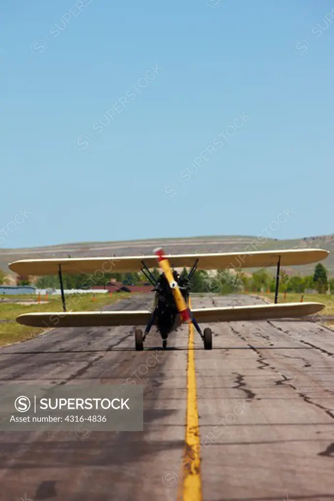 Boeing-Stearman Model 75 Biplane on runway, Lander, Wyoming