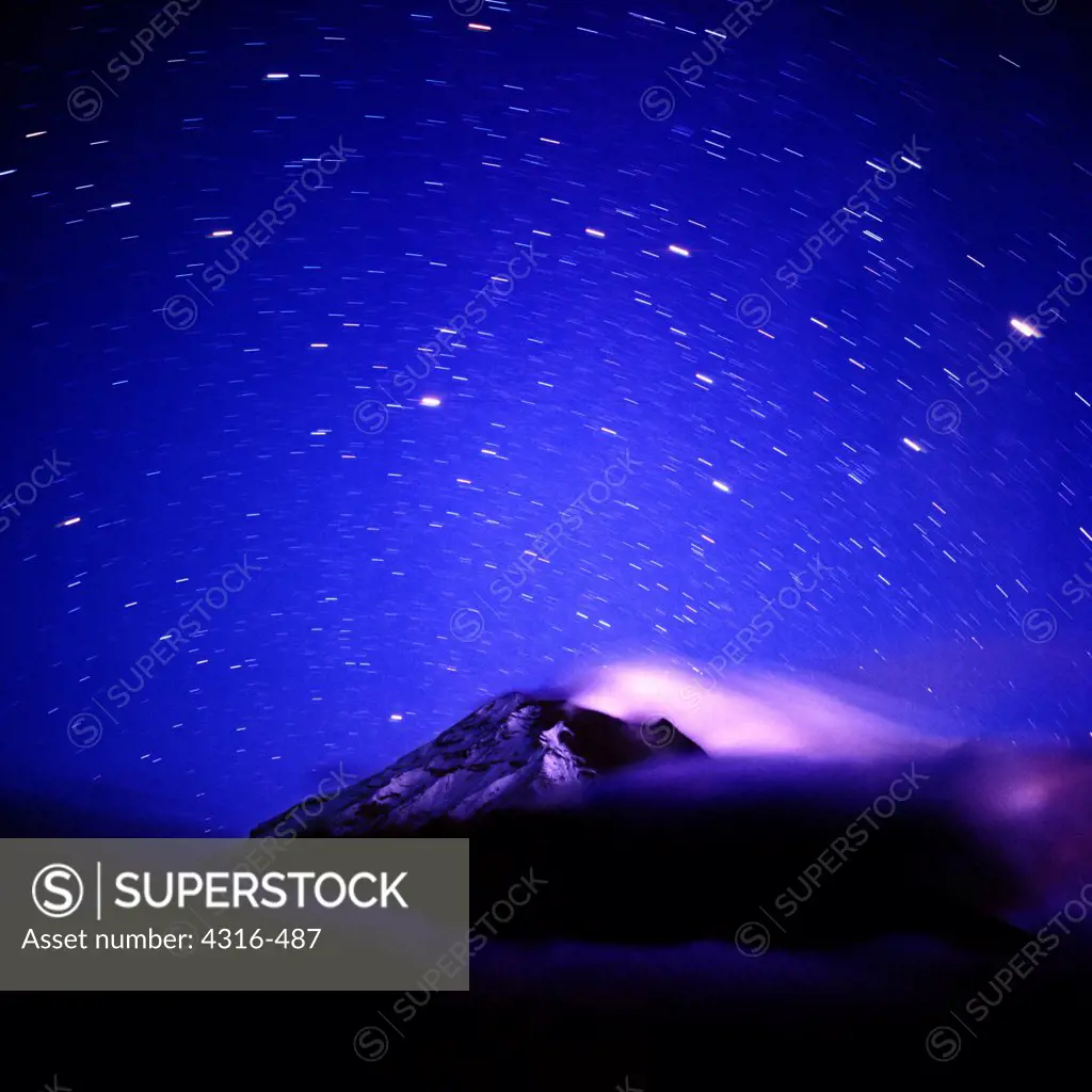 Ecuador's Tungurahua Volcano Vents Steam After an Eruption Under the Stars