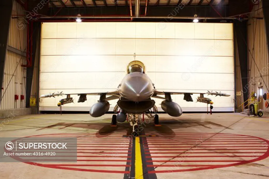 F-16, loaded with live weapons, in alert hangar, Buckley Air Force Base, Colorado