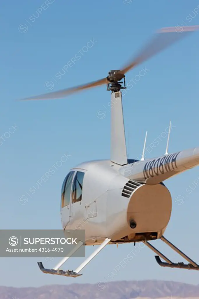 Robinson R44 Helicopter in California desert