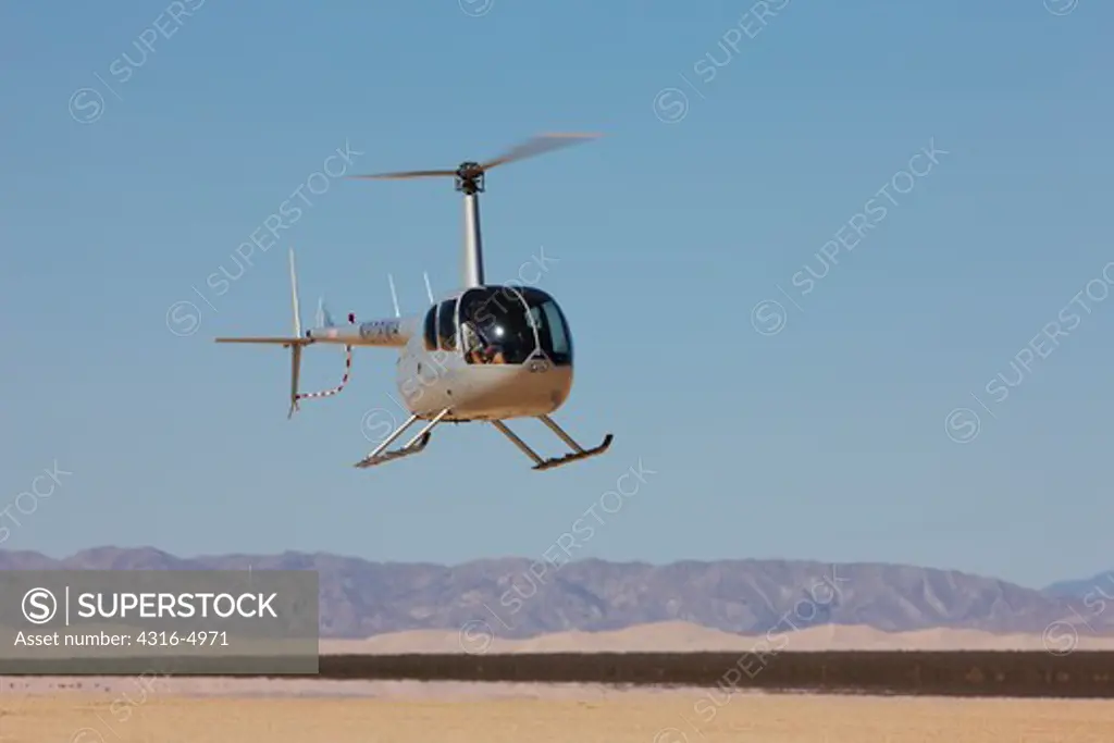 Robinson R44 Helicopter in California desert