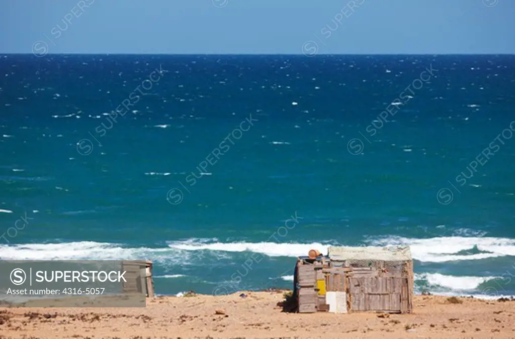 Fishing shack and outhouse on the Atlantic coast of southern Morocco