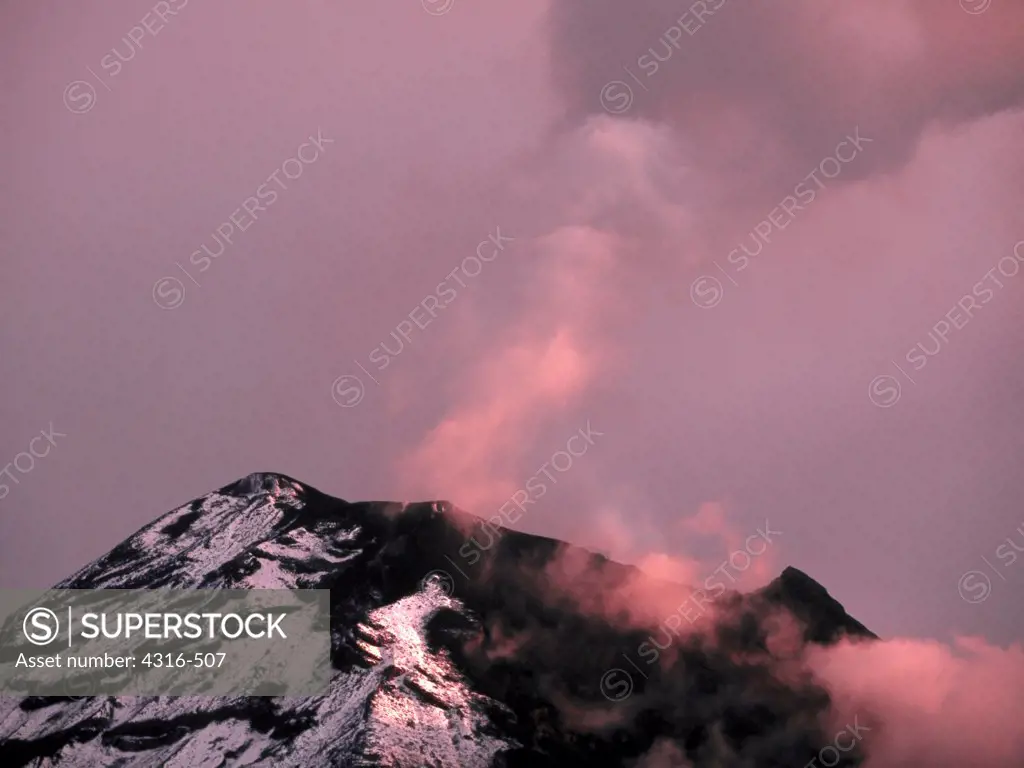 Steam Rises at Dusk from Tungurahua Volcano's Summit Caldera