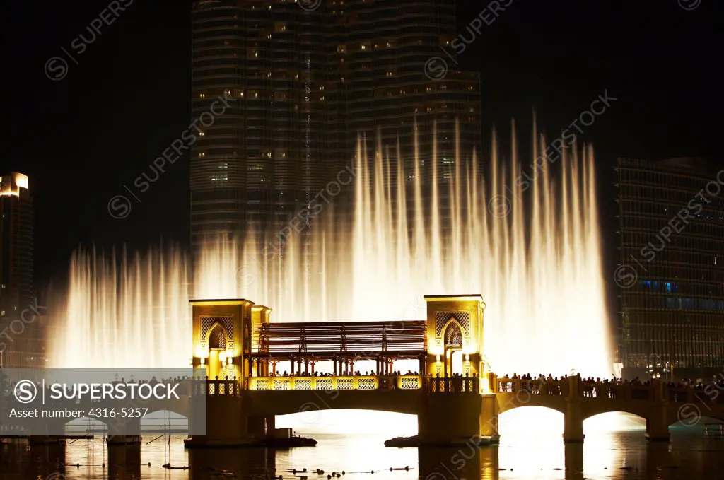 Souk Al Bahar Bridge with fountains at base of Burj Khalifa, Dubai, United Arab Emirates