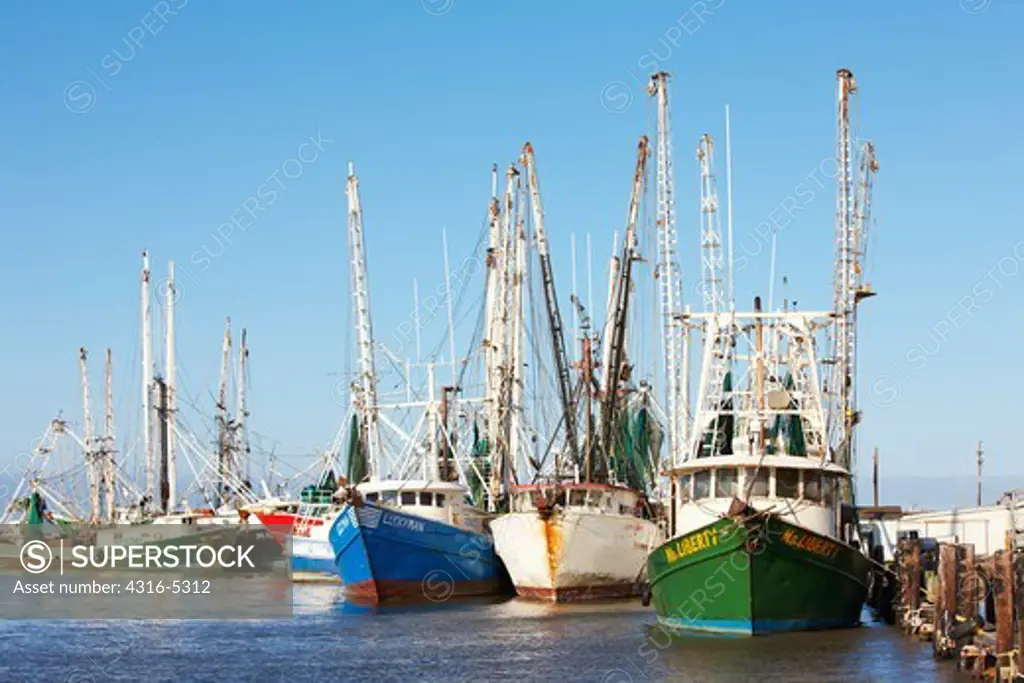 Commercial shrimp boats at a dock, Crystal Beach, Bolivar Peninsula, Galveston County, Texas, USA