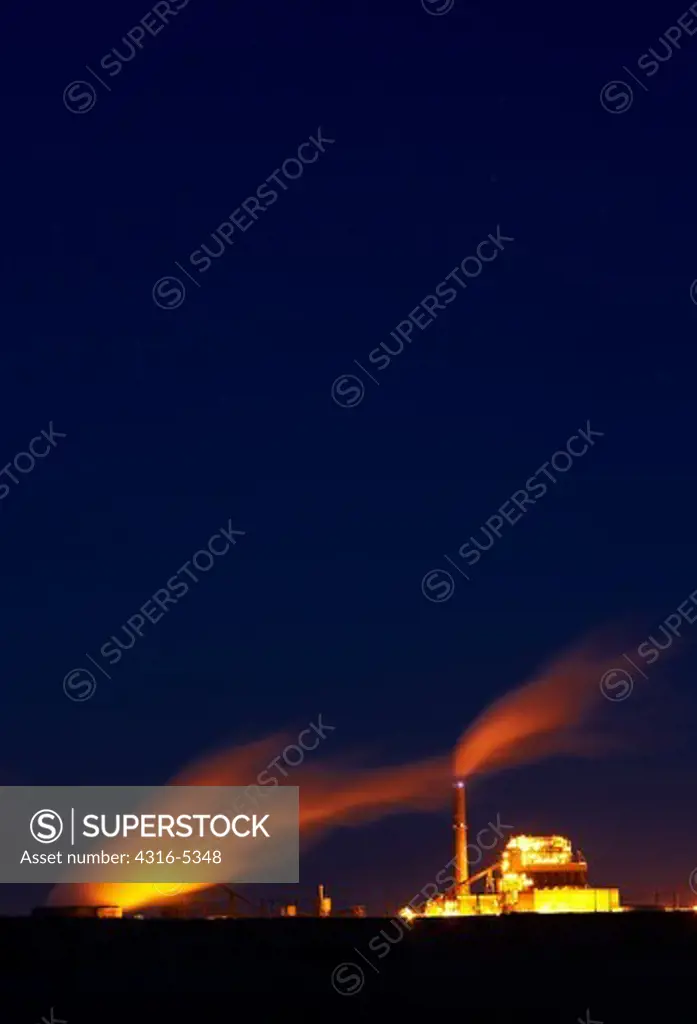 Coal burning electricity production facility at night, Oklaunion, Wilbarger County, Texas, USA