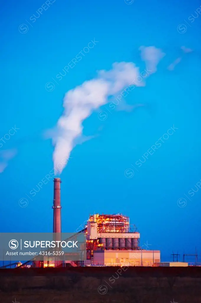 Coal burning electricity production facility at dusk, Oklaunion, Wilbarger County, Texas, USA
