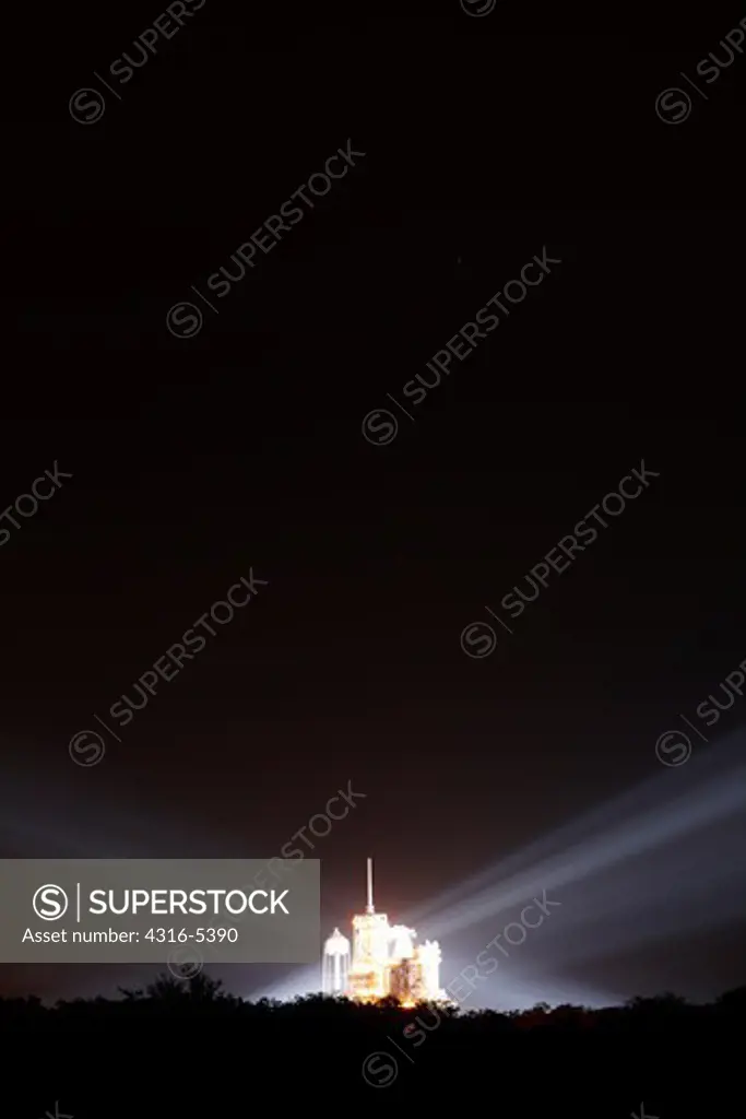 Powerful xenon floodlights illuminate Space Shuttle Endeavour on launch pad 39A and ready to depart on STS-132 at NASA Kennedy Space Center, Merritt Island, Florida, USA