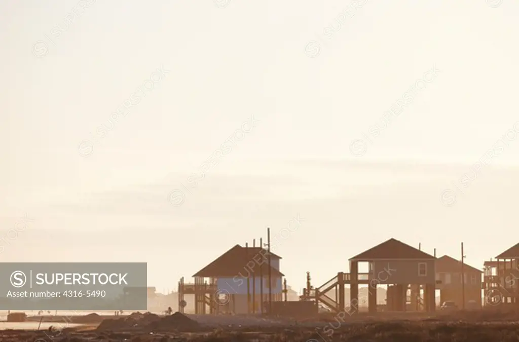 Beach houses on the beach, Crystal Beach, Bolivar Peninsula, Galveston County, Texas, USA