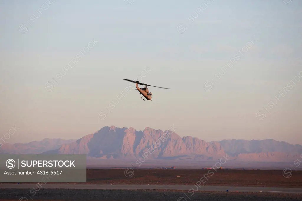 United States Marine Corps AH-1W SuperCobra launches from Camp Bastion, Helmand Province, Afghanistan