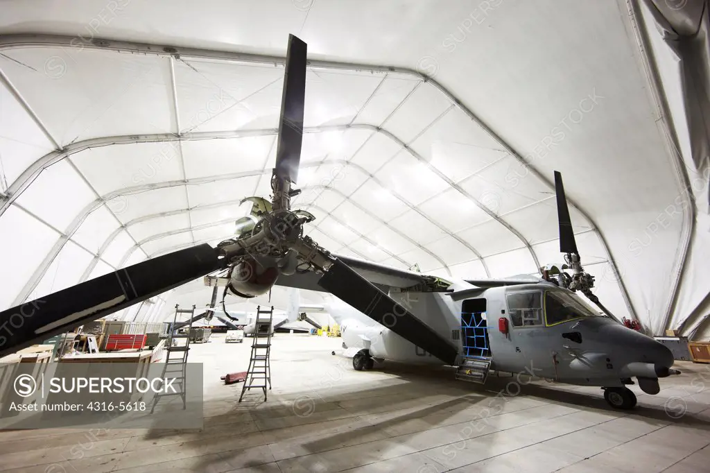 United States Marine Corps MV-22 in expeditionary hangar for maintenance, Camp Bastion, Helmand Province, Afghanistan