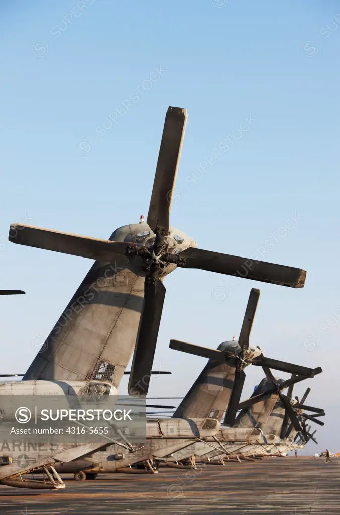 View of tail rotors of line of United States Marine Corps CH-53E Super Stallions at Camp Bastion, Helmand Province, Afghanistan