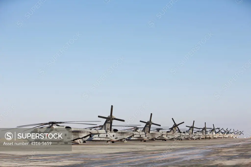 Line of United States Marine Corps CH-53E Super Stallion heavy lift cargo helicopters, Camp Bastion, Helmand Province, Afghanistan