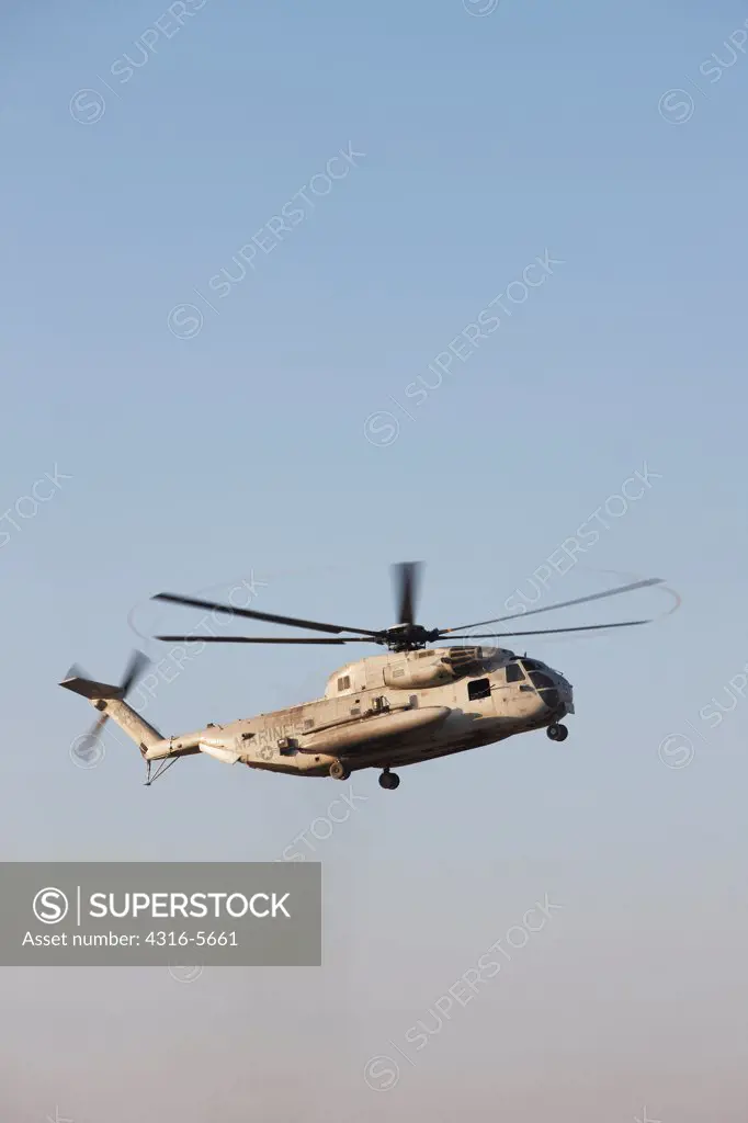 United States Marine Corps CH-53D Sea Stallion heavy lift transport helicopter launches on a mission from Camp Bastion, Helmand Province, Afghanistan