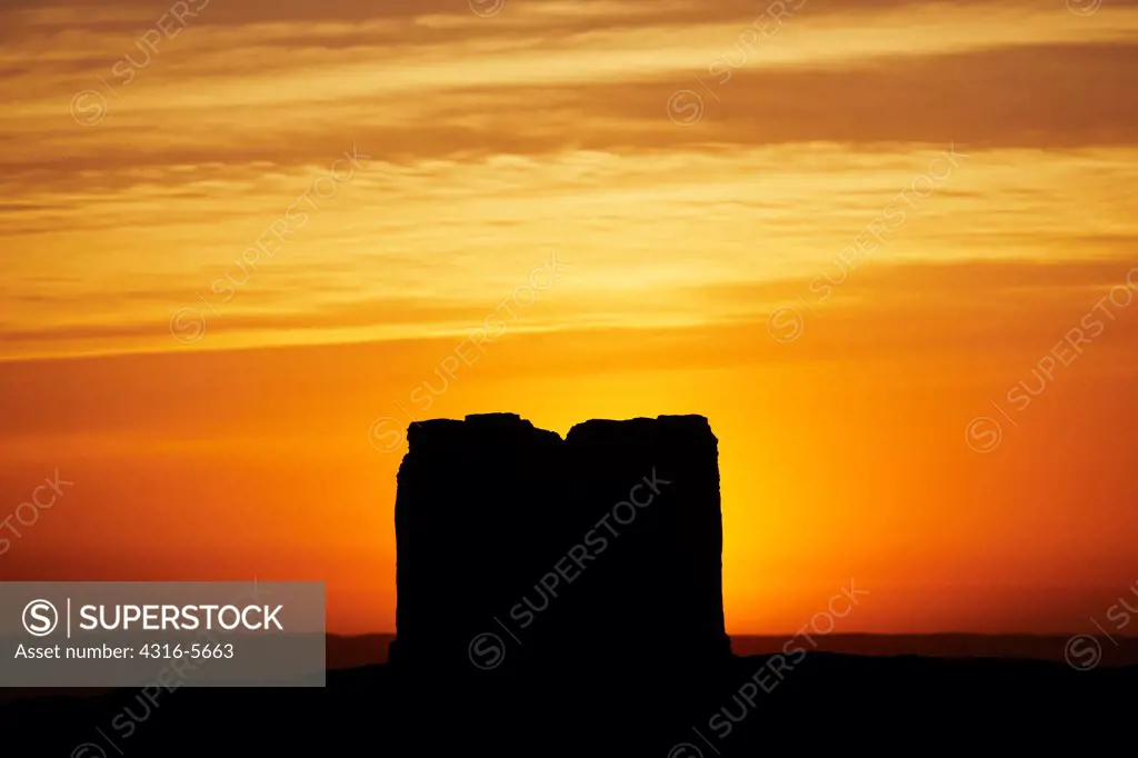 Silhouette of an earthen building at sunrise, Helmand Province, Afghanistan