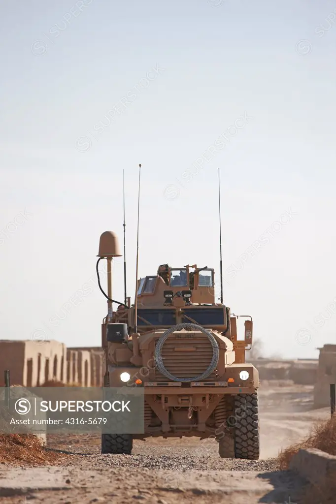 United States Marine Corps MRAP or Mine Resistant Ambush Protected Vehicle during a combat operation in the Helmand Province, Afghanistan