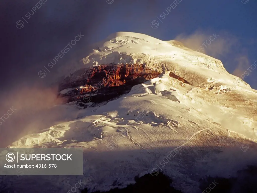 Breaking Clouds Reveal Cotopaxi's Jumbled, Heavily Glaciated Summit