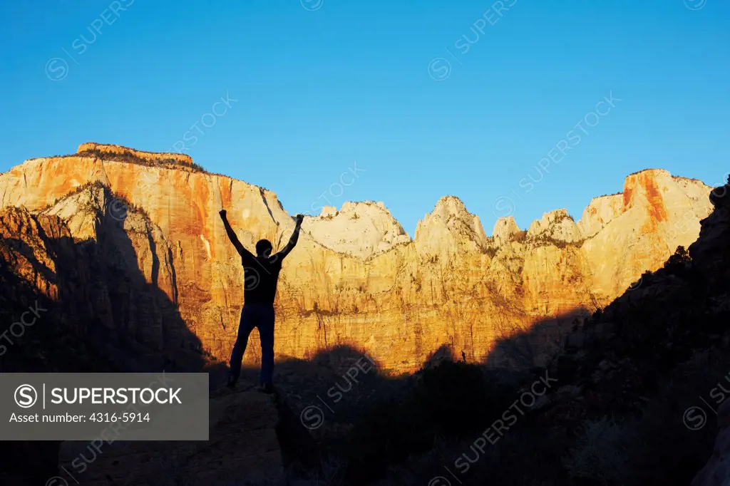 USA, Utah, Hiker silhouette in Zion National Park