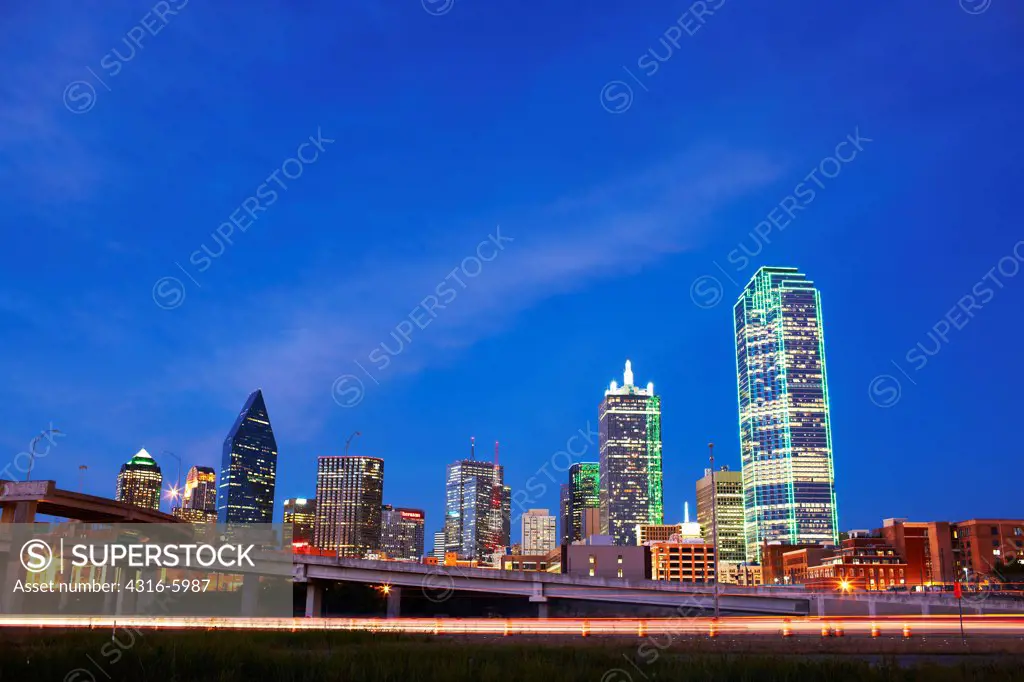 USA, Texas, Dallas, Dusk view of city skyline with Bank of America Plaza
