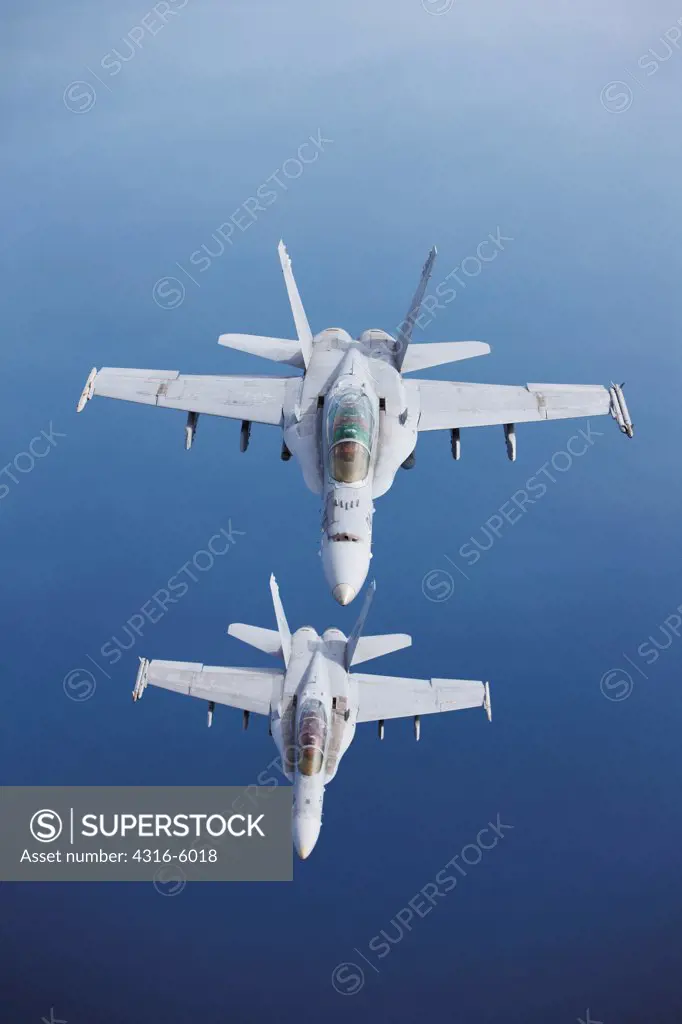United States Marine Corps F/A-18D Hornets flying in formation