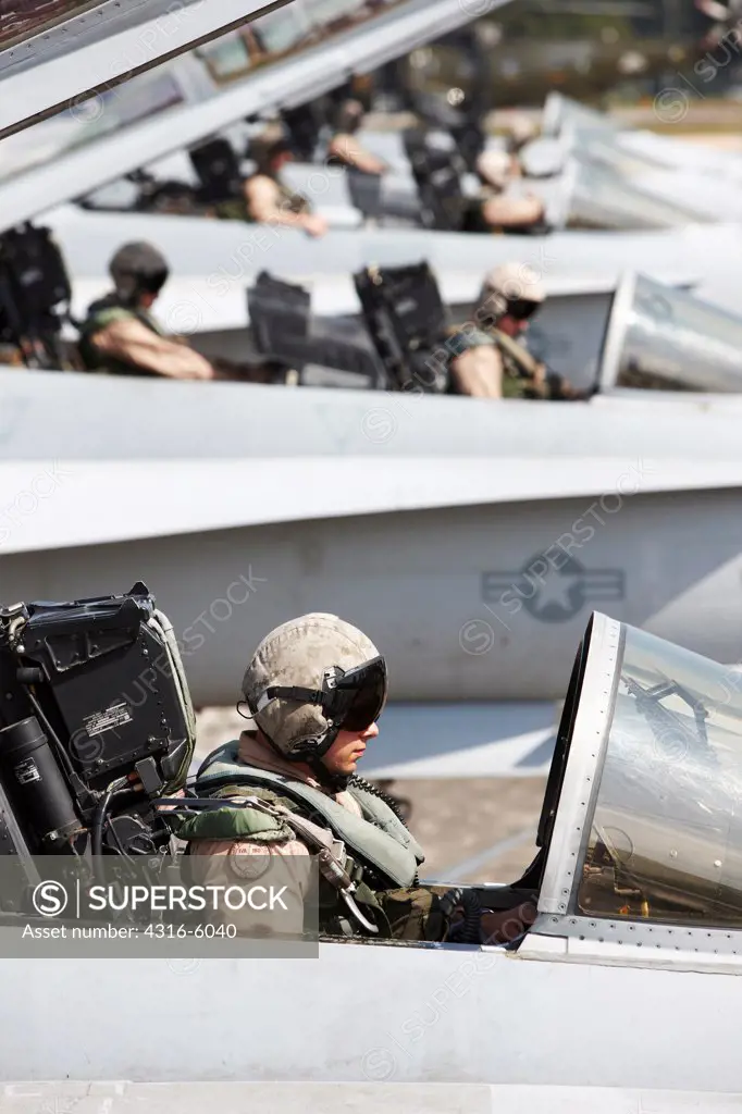 Malaysia, Kuantan Air Base, United States Marine Corps aviators in cockpits of Marine Corps F/A-18D Hornets