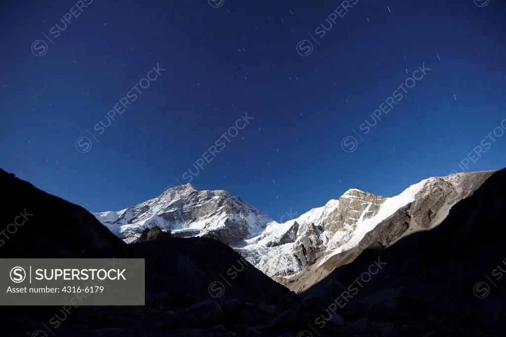 Nepal, Makalu-Barun National Park, Night view of summit of Makalu in moonlight