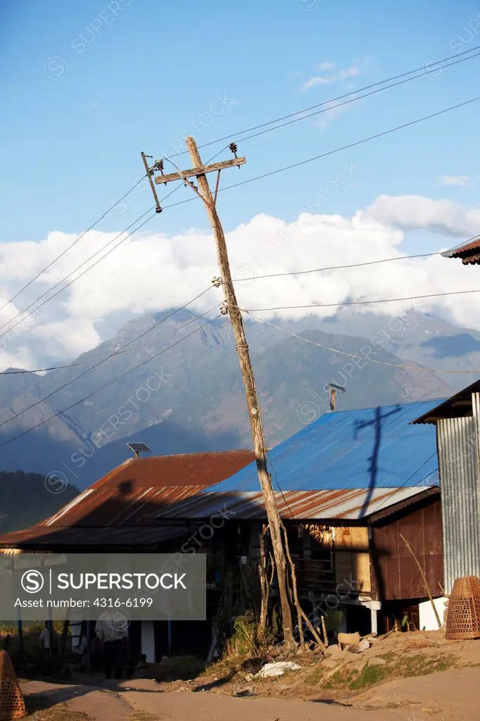 Nepal, Num Village, Leaning power and telephone line pole