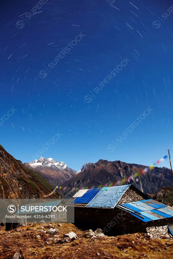 Nepal, Himalaya, Mumbuk, huts in mountains and star trails, long exposure