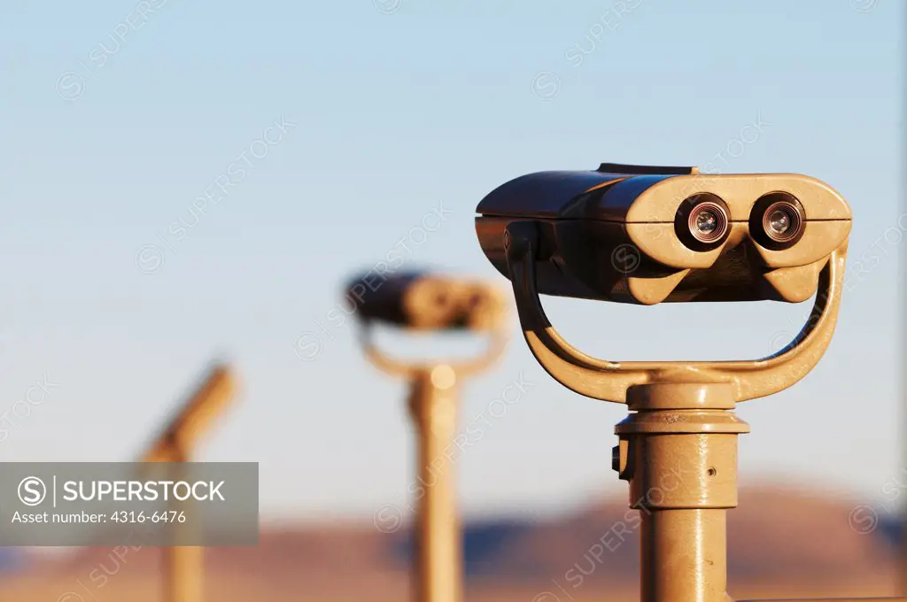 Binoculars mounted to poles at the Marfa Mystery Lights viewing area, Marfa, Texas, USA